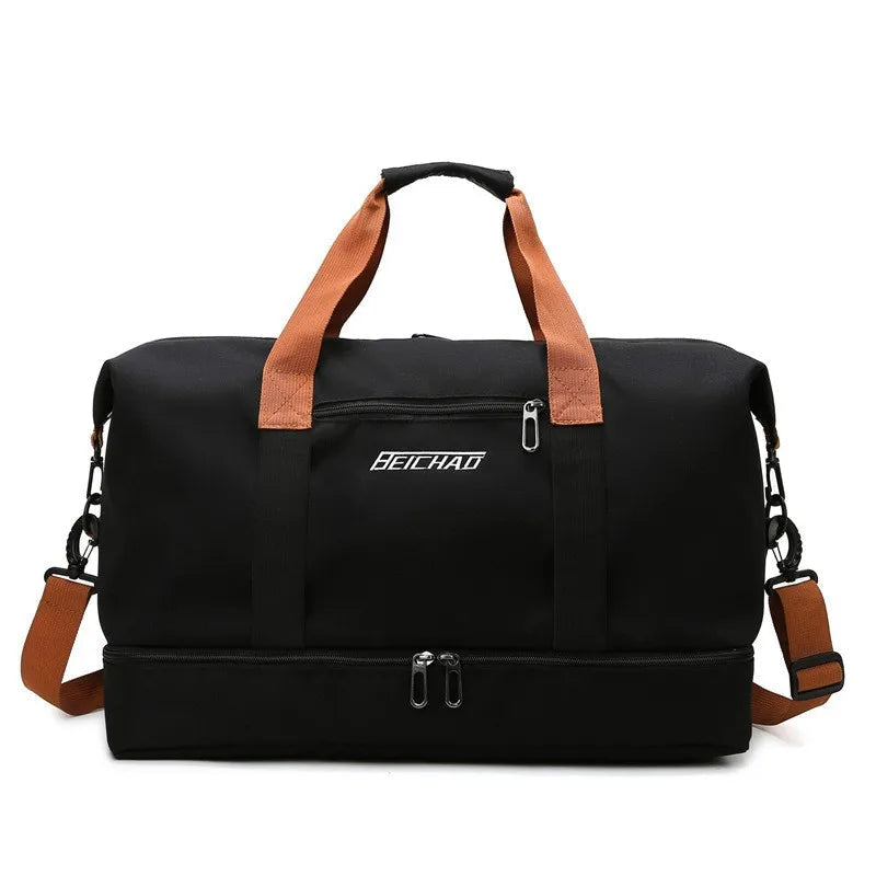 Black duffel bag with brown straps on a white background