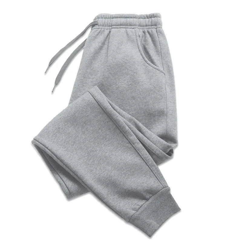 Gray sweatpants with a logo on a white background