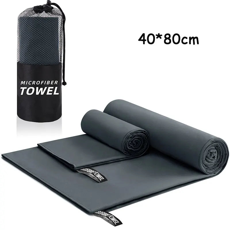 Microfiber towel with carrying case on a white background