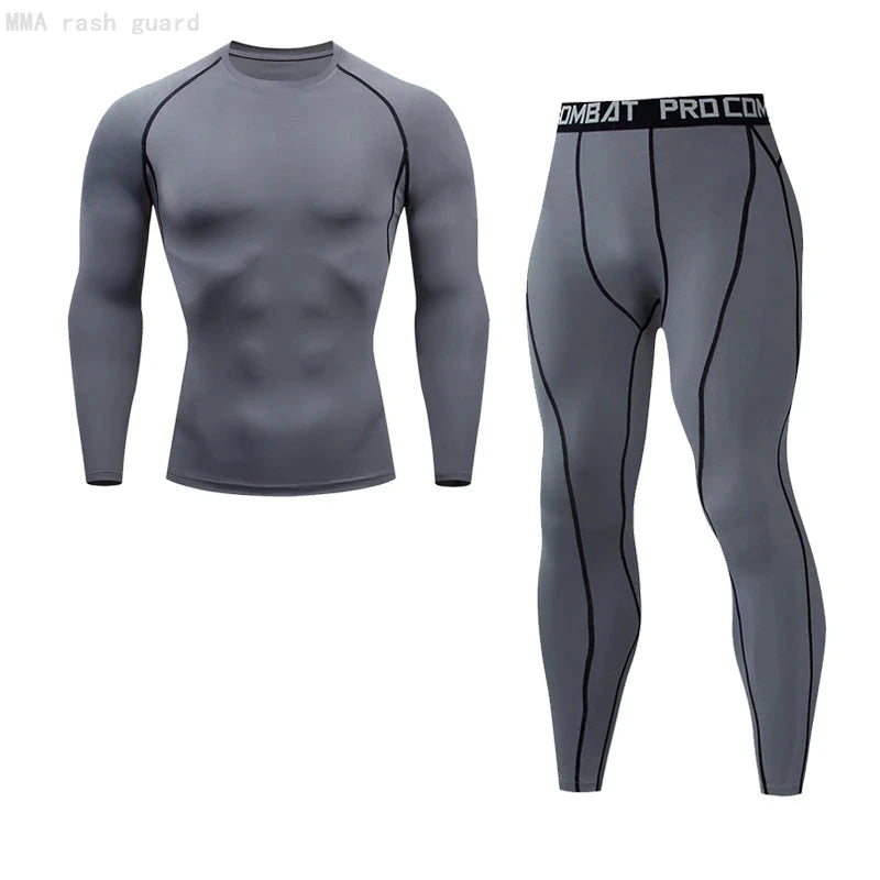 Gray men's compression sportswear set with black seam detailing, includes long-sleeve top and leggings for training or yoga.