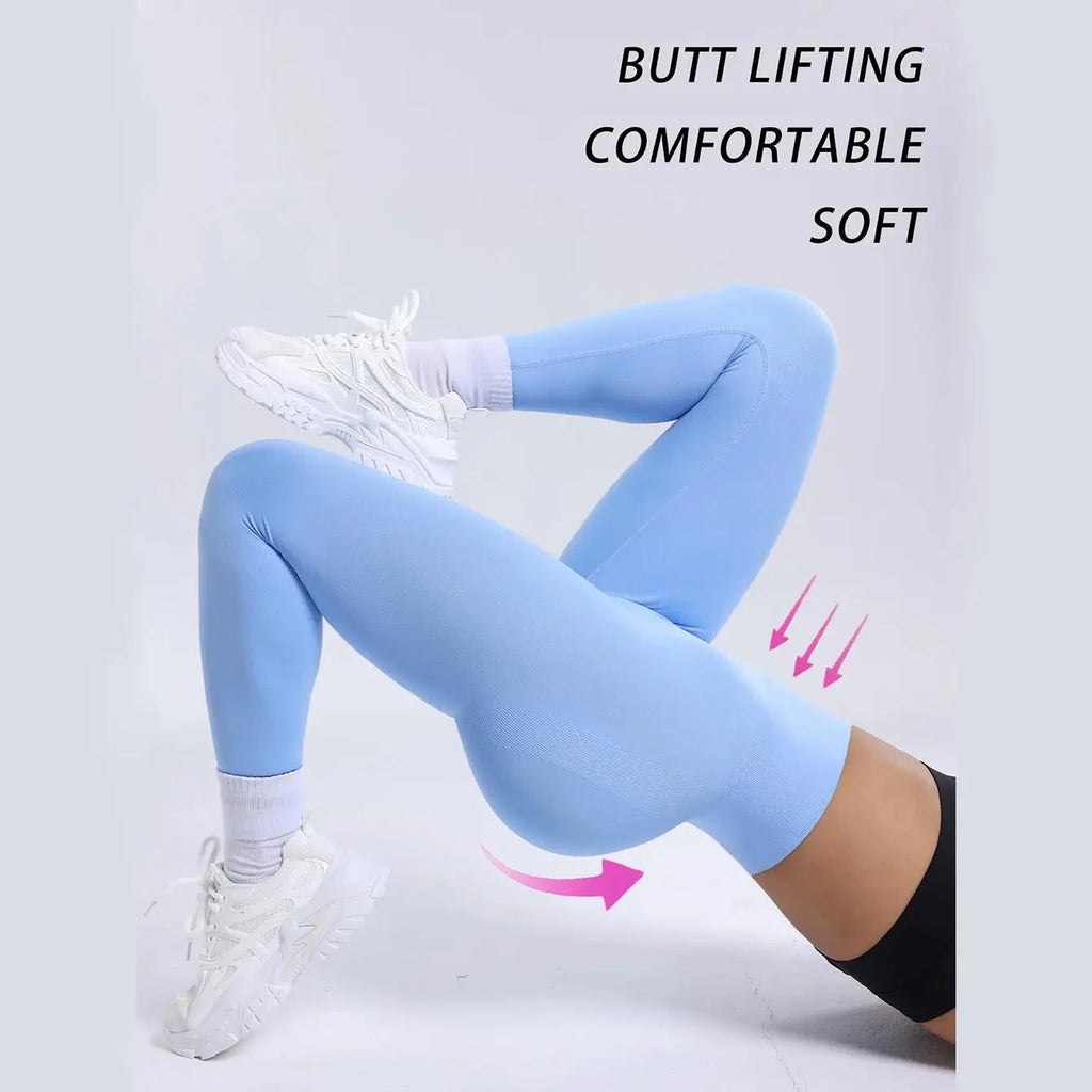 Light blue seamless leggings for women fitness, featuring high waist and butt lifting support for yoga, jogging, and gym workouts.