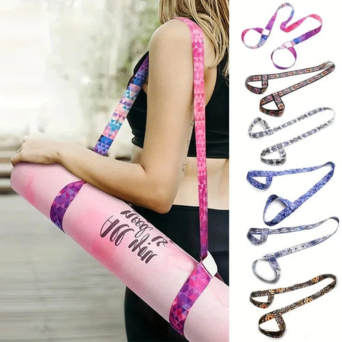 Adjustable yoga mat strap in pink geometric pattern used as a shoulder strap for carrying a rolled yoga mat. Ideal for fitness and travel convenience.