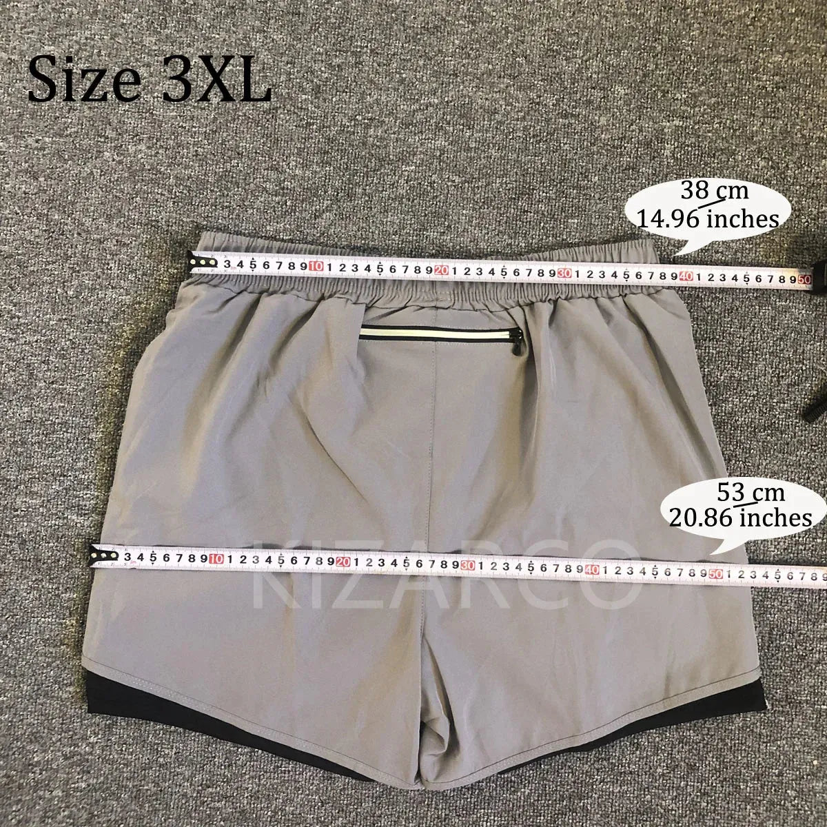 3XL size gray shorts from men's summer quick drying sport suit, showing waist and length measurements in centimeters and inches.