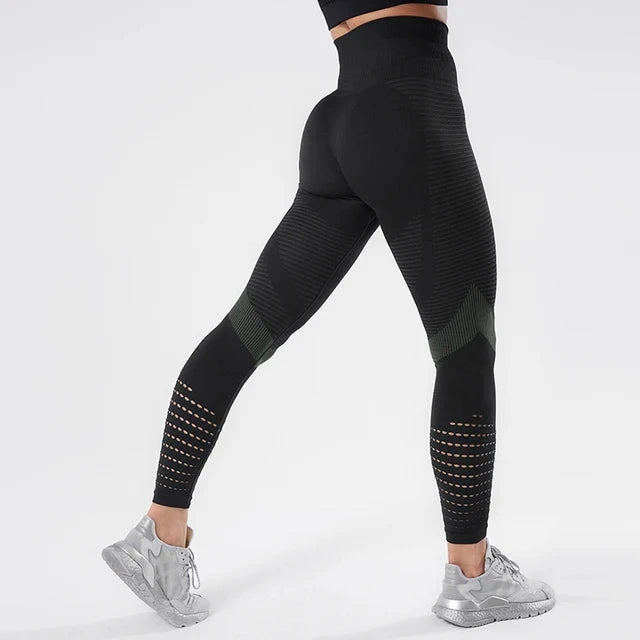 Black seamless Women Fitness Leggings High Waist Leggings Sportswear with contour shading and breathable mesh panels.