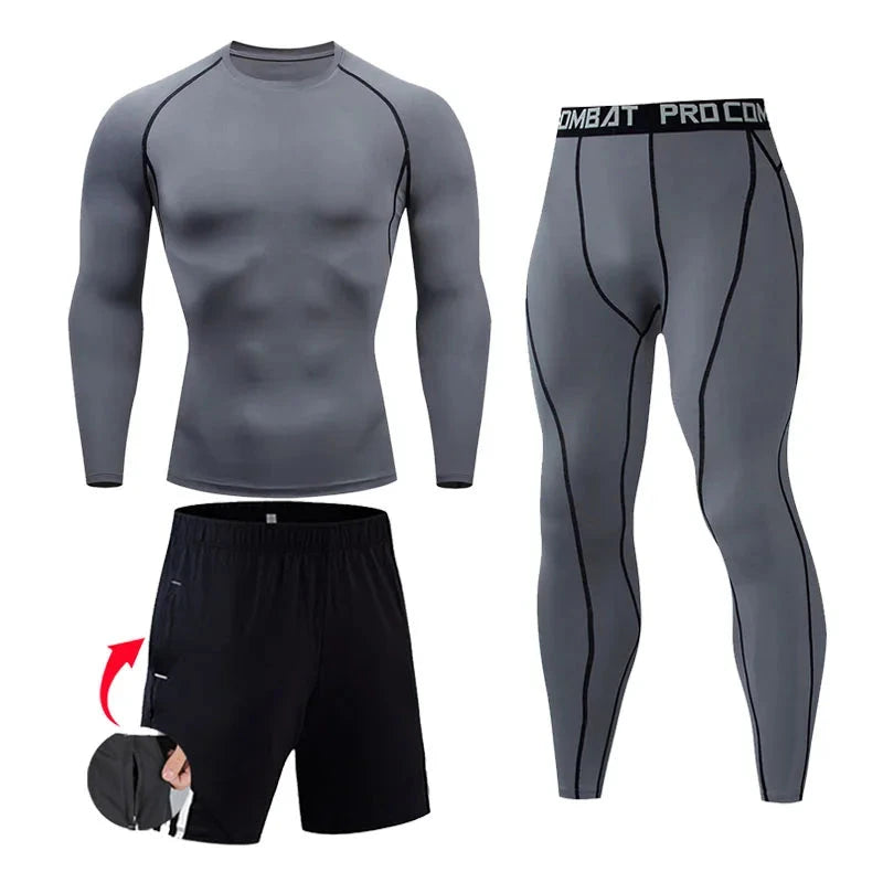 Gray men's compression workout set with black seam accents, includes long-sleeve top, tights, and shorts for fitness training.